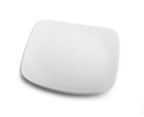Obraz premium empty white plate isolated on white background