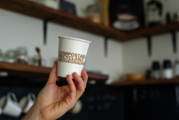 Biodegradable paper cup in cafe
