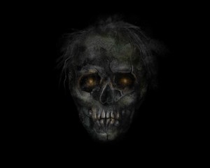 Scary zombie head on black background. Dead man with burning yellow eyes