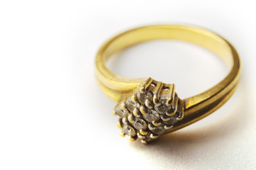 Golden Wedding Ring with diamond on white background