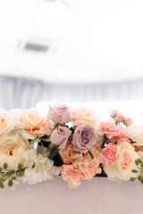 Gentle wedding flower decor. Beautiful background of fresh flowers.