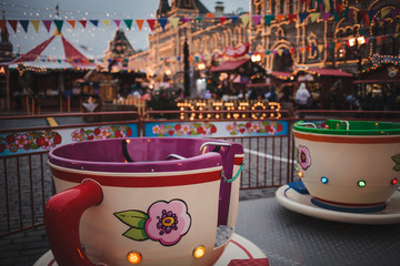 Children's carousel at the New Year's fair in Moscow, winter 2018