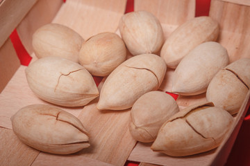 Background: pecan on a red background