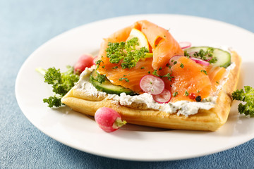 waffle with salmon, cheese and vegetables
