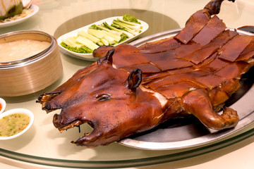 Barbecued suckling pig in restaurant