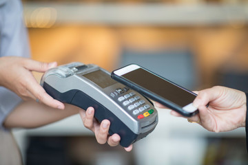 contactless payment by mobile phone  in cafe