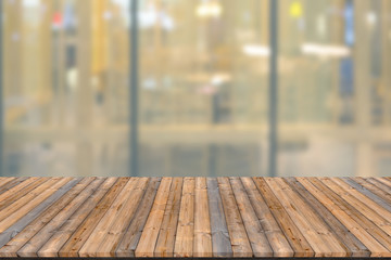 Empty wooden board space platform with blur restaurant background