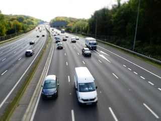 Fototapeta na wymiar Tilt shift photo of the M25 London Orbital Motorway near Junction 17 in Hertfordshire, UK