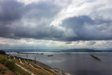 Volga river and breakwater in cloudy weather - 296116007
