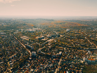 Photo from above of nice city during autumn time