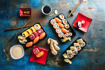 Gourmet traditional sushi set with ginger, chopsticks and soy sauce 