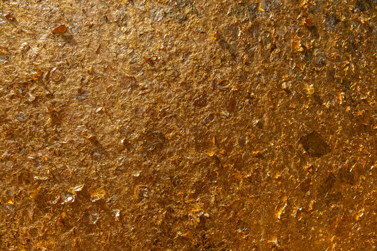 Shiny yellow gold leaf texture background For closing the Buddha.