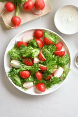 Radish salad with lettuce leaves
