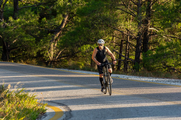 male biker cycling on a mountain road