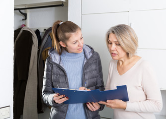 Female caseworker conducting survey