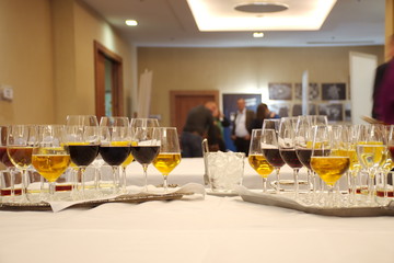 Group of glasses with drinks on the table