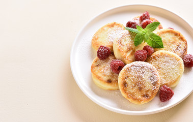 Cottage cheese pancakes with fresh raspberries