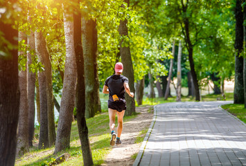 A man Jogging in a summer Park 