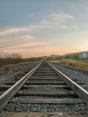 Fototapeta na wymiar Train tracks in a sunny day