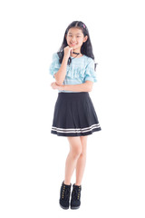 Fototapeta premium Full length of pretty asian teenage girl smiling isolated over white background