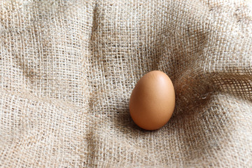 Isolated  Organic brown two Eggs  of chicken uncooked freshness nutrition healthy on brown sack for background texture soft focus close up