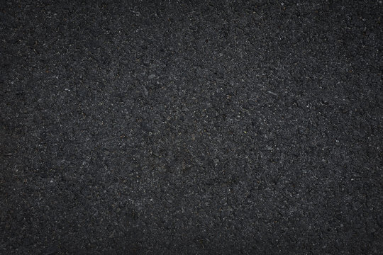 Black asphalt floor or road texture background.
