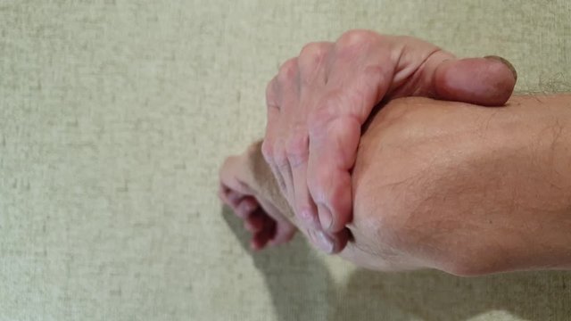 Pain in the elbow. Elbow joint. Man elbow.