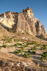 Landscape with cave houses in the rocks at Cavusin, Cappadocia, Turkey