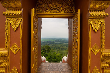 Aerial view through door frame at Pra That Doi Pra Chan temple