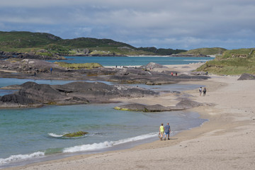Tourists on a beach in the Ring of Kerry peninsula in the Republic of Ireland
