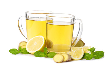 cup of hot tea with ginger, lemon and mint isolated on a white background