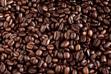 Fototapeta premium Tło palonych ziaren kawy, arabica i robusta.