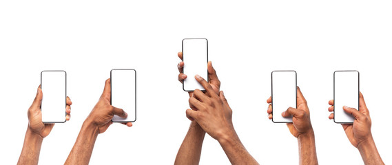 Obraz na płótnie Canvas Man's hands using smartphone with blank screen on white background