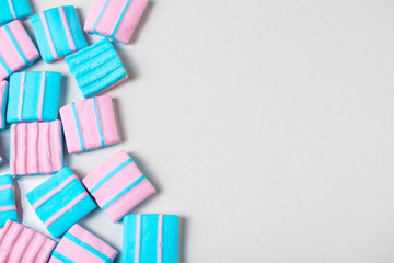 Fototapeta na wymiar Abstract background with lots of colorful pink and blue marshmallows. Flat lay overhead