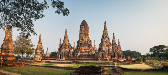 Tourists visit Wat Chai Watthana Ram Temple located in the historic district of Ayutthaya, Thailand.