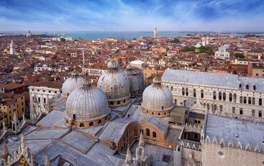 Fototapeta na wymiar domes of Saint Mark's Basilica and Venice cityscape, aerial view, Venice, Italy