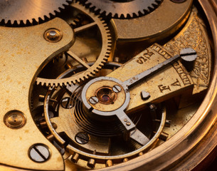Close up of 100 year old pocket watch mechanics 3