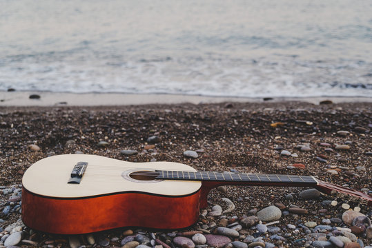 Classical guitar on a background of the sea