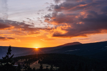 Sun setting over the giant mountains after a warm autumn day, taken on the Polish-Czech border. 