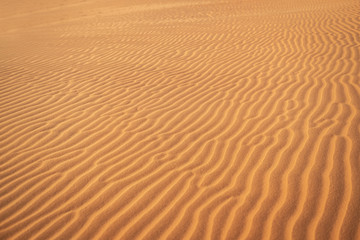 Abstract background and texture of sand waves in desert