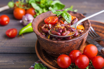 Lobio with red beans. Traditional Georgian dish of stewed beans and walnuts close-up