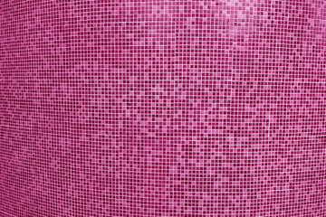 Tile mosaic of swimming pool in pink tone.