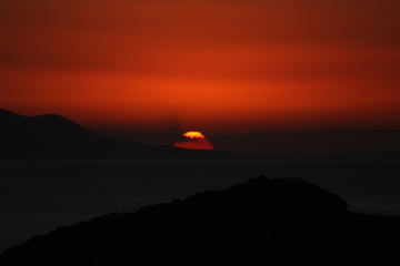 Aegean island landscape and architecture: sea, wind, sand and sunlight