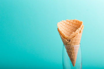 waffle cones from ice cream on blue color background