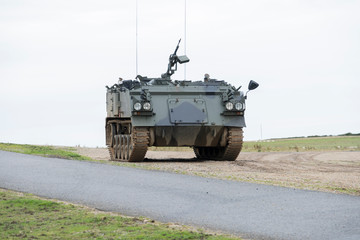 British army AFV 432 troop carrier on open ground