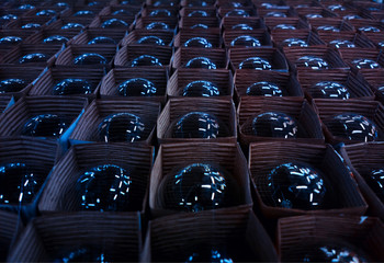 Fototapeta premium Multiple electric bulbs at supermarket bokeh background