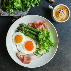 healthy breakfast (fried eggs, bacon, vegetables, asparagus beans, coffee and more) menu concept. food background. copy space. Top view