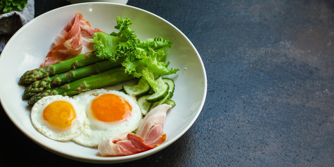 healthy breakfast (fried eggs, bacon, vegetables, asparagus beans, coffee and more) menu concept. food background. copy space. Top view