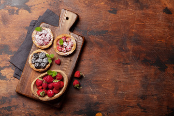 Set of cakes with berries