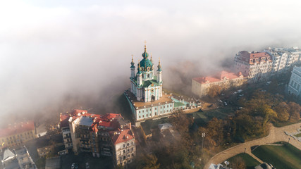 Aerial view of St. Andrew's Church in heavy fog, Kiev, Ukraine